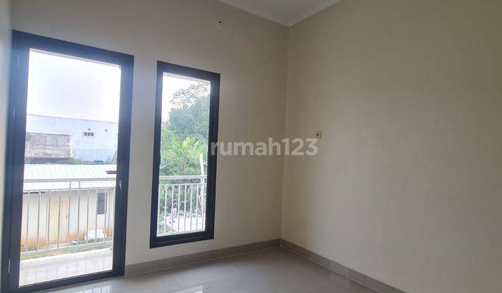 Rumah 2 Lantai Murah Plus Rooftop 25