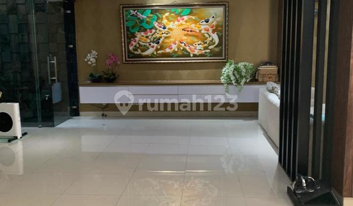 Rumah Bagus Semi Furnished di Kebayoran Garden Bintaro 8962 Rn