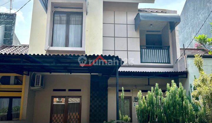 Pangkalan Jati Siap Huni dalam Komplek Rumah 2 Lantai SHM Butuh Renovasi 1