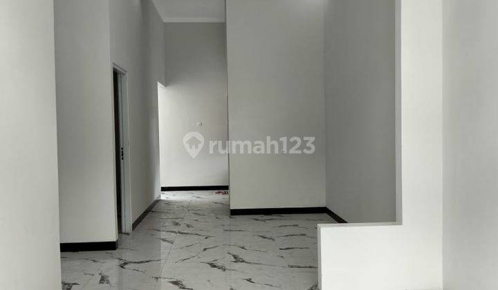 ruang tamu rumah baru minimalis siap huni