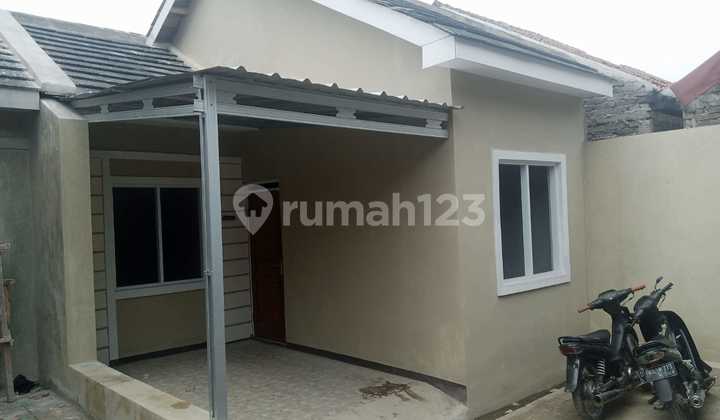 Rumah Strategis Minimalis Nyaman Bebas Banjir Full Spek Asri 1