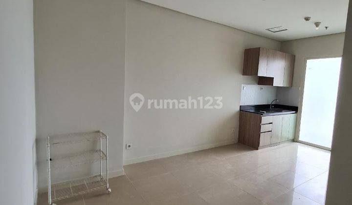 2BR Unfurnished Apartemen Madison Park Mall Central Park 1