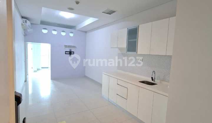2BR Unfurnished Kondominium Grand Madison - Mall Central Park 1