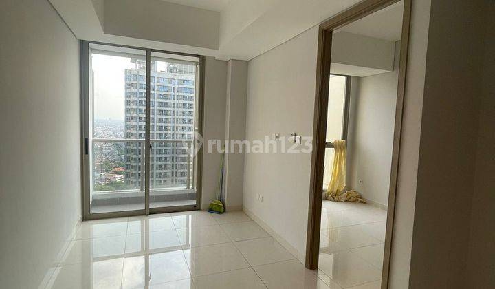 1BR Unfurnished Apartemen Taman Anggrek Residences Jakarta Barat 1