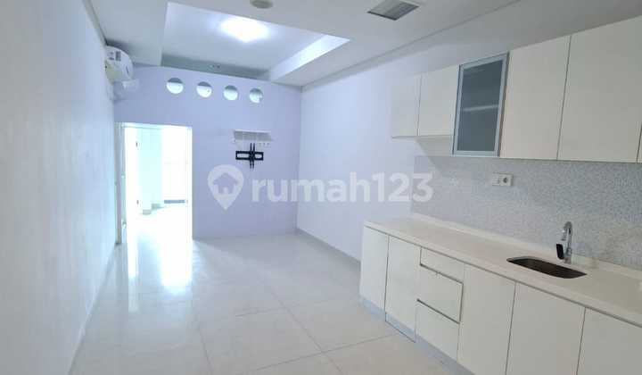 2BR Unfurnished Kondominium Grand Madison - Mall Central Park 2