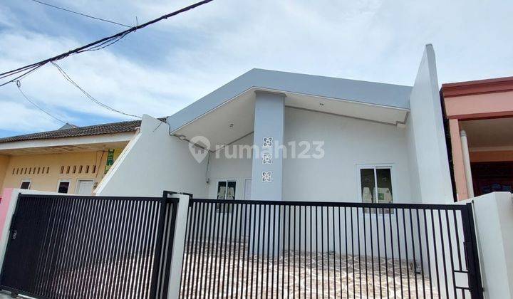 Rumah cantik harga menarik . Rumah baru siap huni di kawasan perumahan puspitek Rumah 1