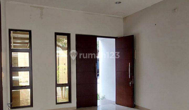 Rumah lebar 8 kamar 4 hadap utara  carport 2 2