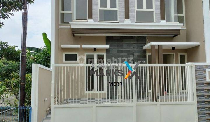 Rumah Sebelah Taman di Sutorejo Prima Baru Gress 1