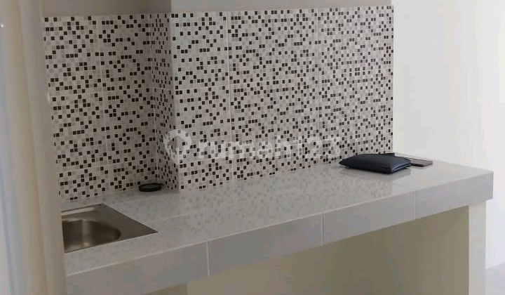 Apartemen Puncak Dharmahusada 2 Br Termurah.