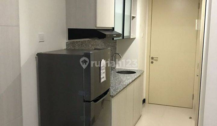 Apartemen Amor Pakuwon City Furnished Bagus 1