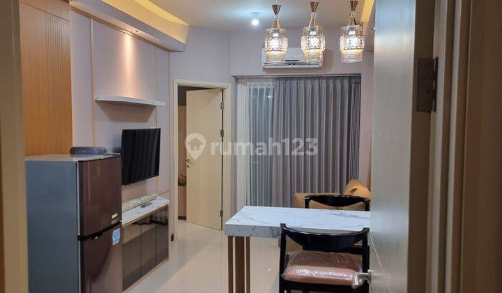 Apartemen Amor Pakuwon City 2 Kamar Tidur Corner Paling Besar  1