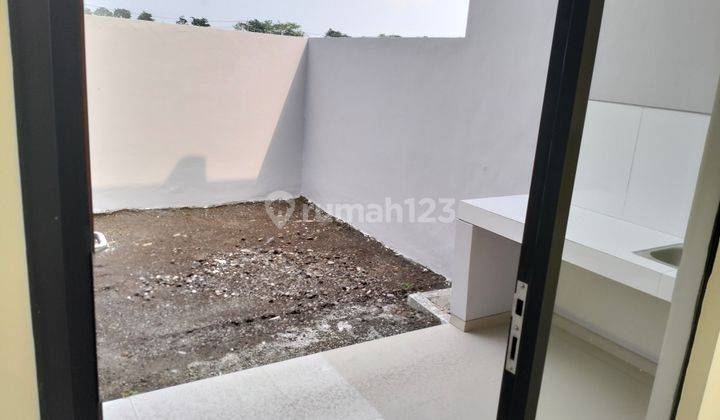Rumah cluster posisi tengah kota  17