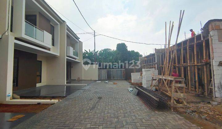 Rumah clustee 2 lantai free BPhTB n canopy dkt tol jatibening 2