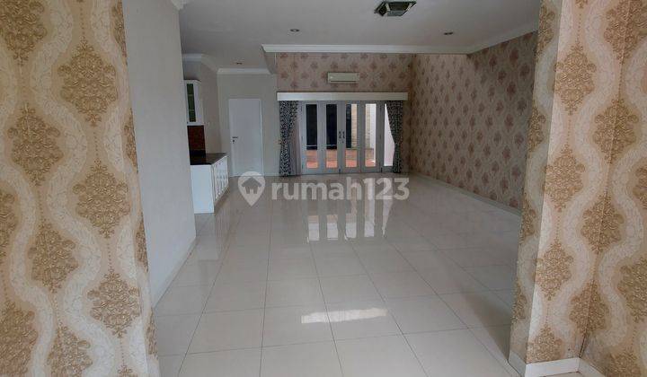 Rumah di Raffles Hills, Cantik, Siap Huni, Balkon Luas 1