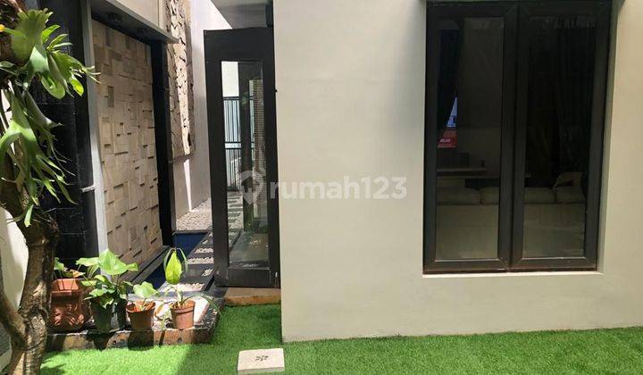 Rumah Siap Huni Di Raffles Hills Dengan Taman Belakang Cantik 2