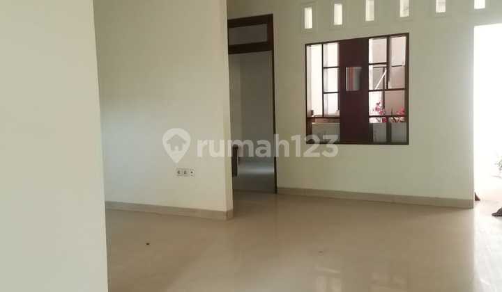 Rumah di Raffles Hills, Rapih 2