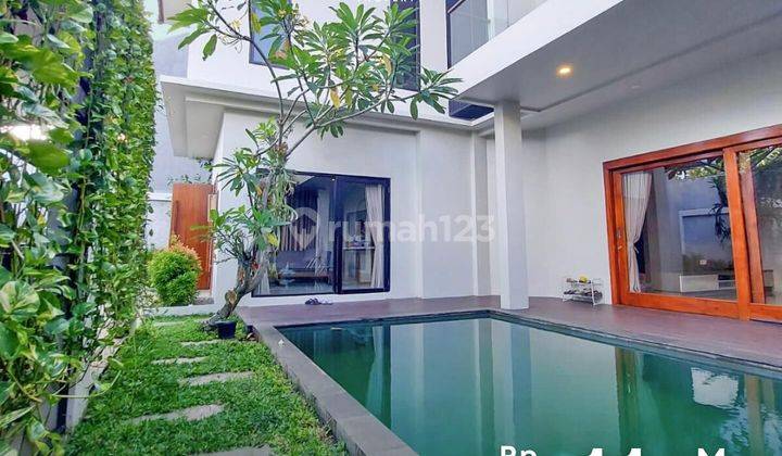 Rumah  Modern Tropical 2 Lantai Lahan Parkir Luas 2