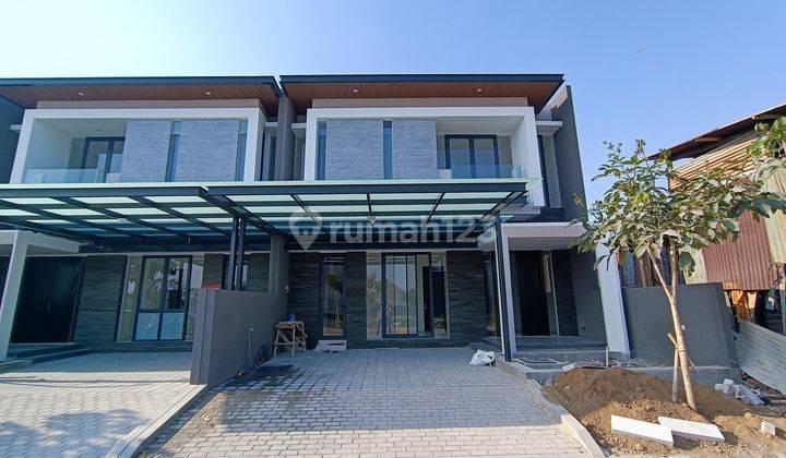 Rumah Baru Minimalis Modern di Woodland Citraland, Surabaya 1