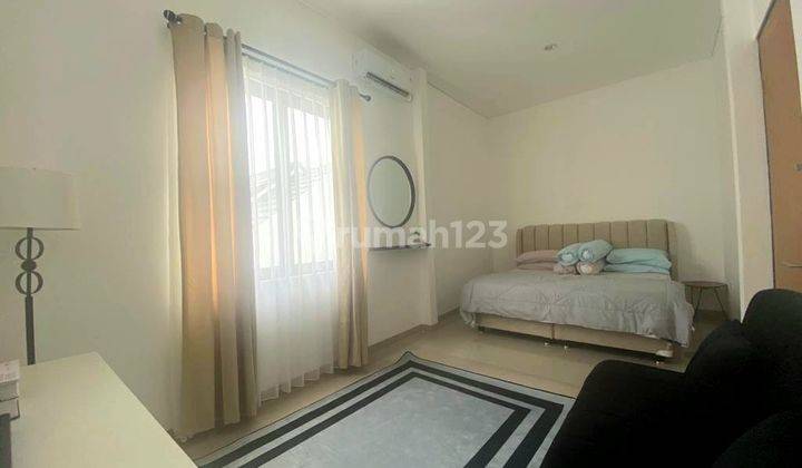 Rumah Hoek Row Jalan Depan Lebar Semi Furnished Di Sawangan 2