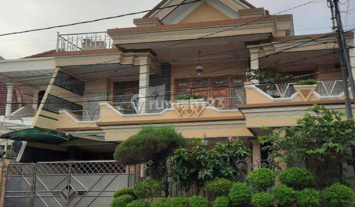 Rumah Gaya Klasik Di Darmo Surabaya Barat Lebar 12 Meter 1