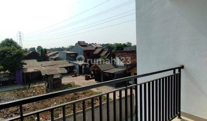 Rumah di Jalan raya kodau 2 Lantai SHM Strategis dekat Tol Jorr.  2