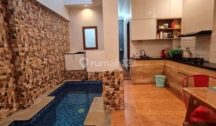 RUMAH MURAH MEWAH ADA POOL ROOF TOP SIAP HUNI DI TANJUNG BARAT  1