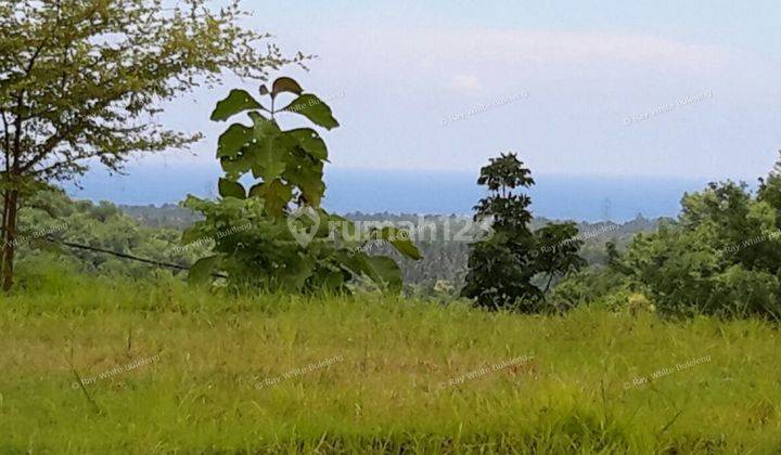 7200 m2 land located west of the city Seririt with great ocean and mountain views. 1