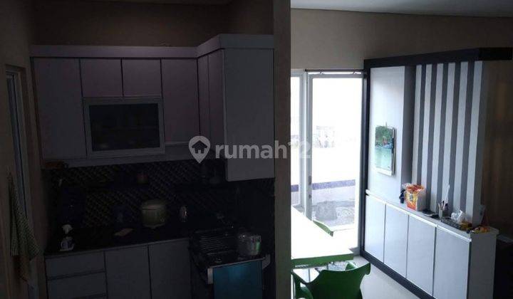 DISEWAKAN RUMAH CANTIK DENGAN FURNISHED DAERAH WANEA, HARGA SANGAT MURAH 2
