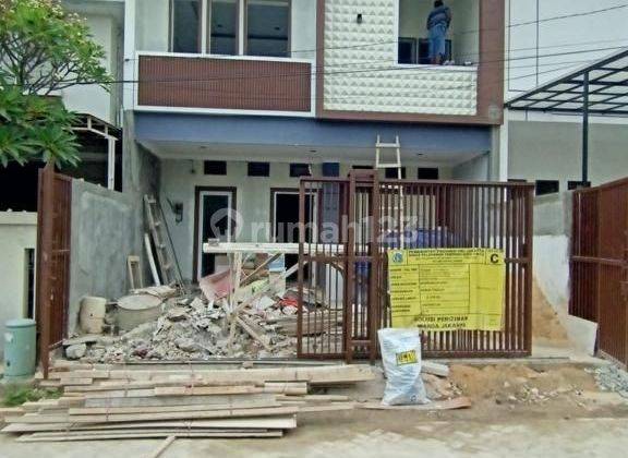 Dijual cepat
Rumah baru 2 1/4 lantai di Taman surya 5, kalideres, jakarta barat 1