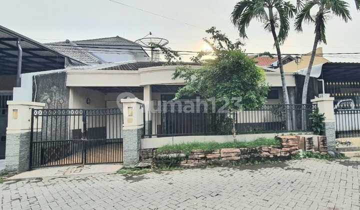 Ca964 For Sale Modern 1-Storey Strategic Wide Row House with SHM in Lebak Indah Surabaya 1