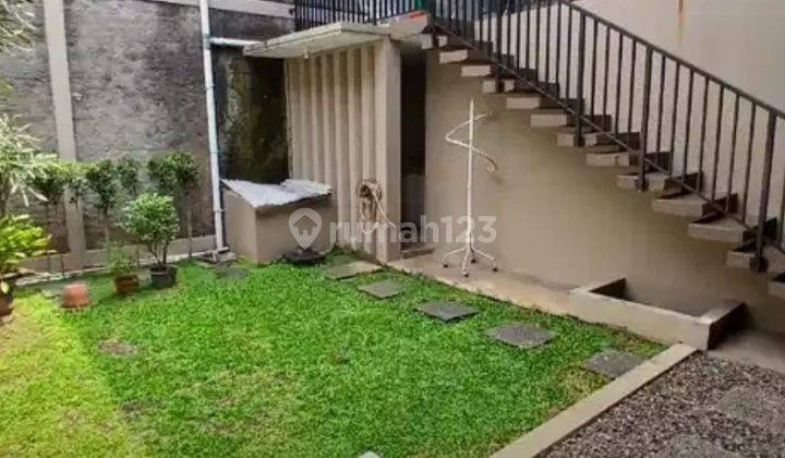 Rumah Puspita Loka Dengan Taman Luas 2