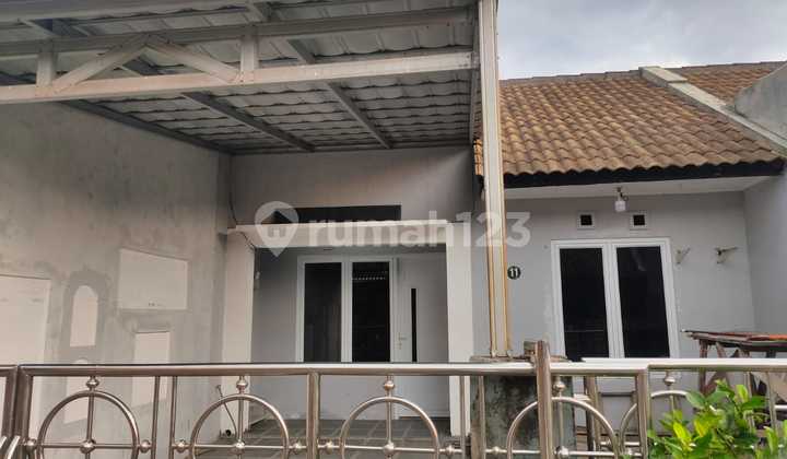 Minimalist Residence Renovated Puri Hijau Regency 1