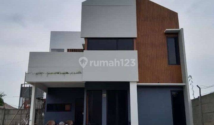 Rumah sawangan lokasi super strategis 5menit ke Tol Rumah di Jln kesadaran 1 pondok petir Bojong Sari Depok 2 Lantai SHM Baru 1