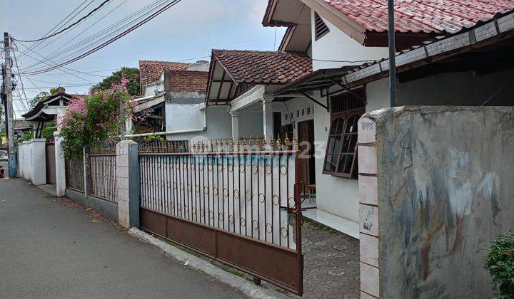 Rumah tua dengan tanah  255m2 diHarjamukti Cimanggis Depok 1