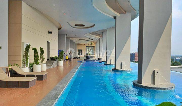 kolam renang jual rugi apartement trans park