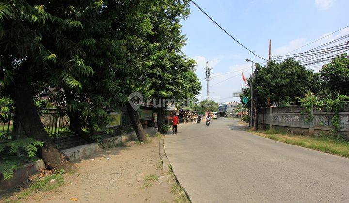 Rumah Pinggir Jalan Raya Dengan Taman Yang Luas , Cocok Untuk Usaha  2