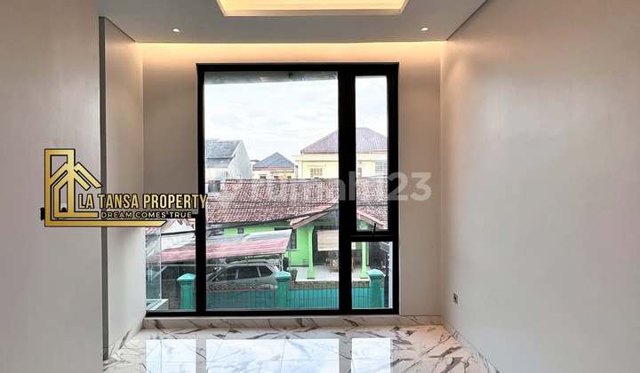 Rumah Desain.american Clasik Dekat Pintu Tol Desari 2