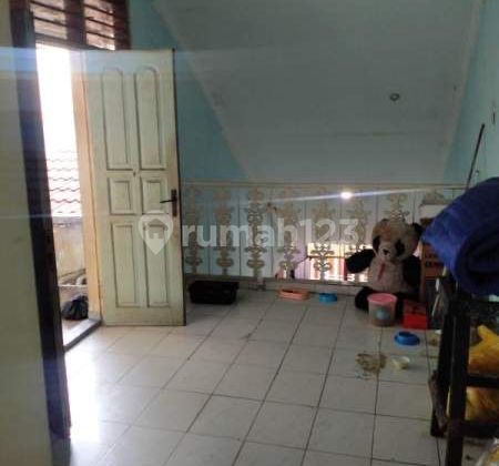 For Sale Cheap House with Large Land in Buaran Duren Sawit Complex 2