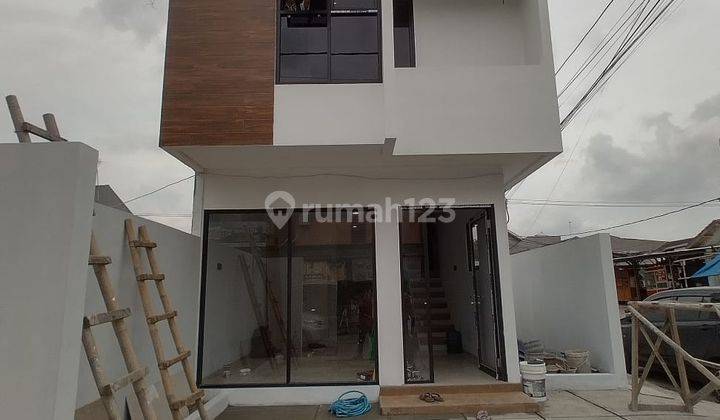 Rumah Modern Bebas Banjir Pinggir Jalan Galuh Mas Karawang 1