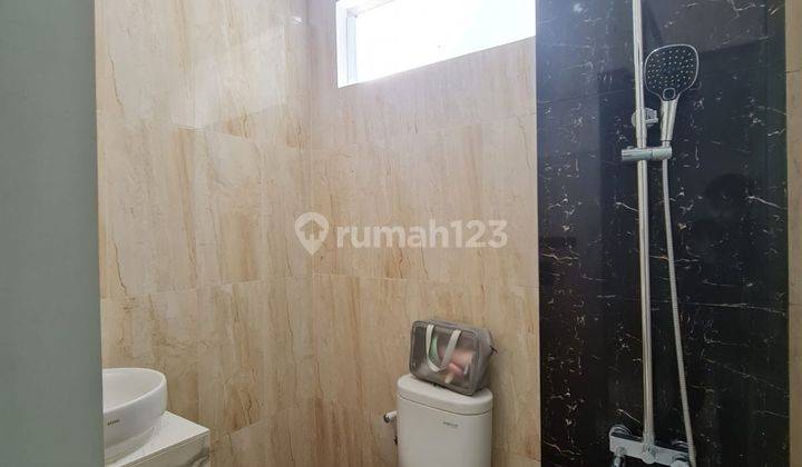 Rumah bagus minimalis modern dalam cluster  13