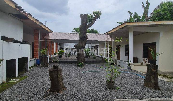 Rumah strategis pinggir jalan utama dengan bangunan kolonial  1