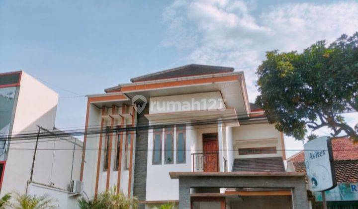 Rumah bagus pinggir jalan siap huni 1