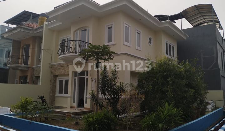 Rumah 2 lantai hoek mutiara taman palem siap huni