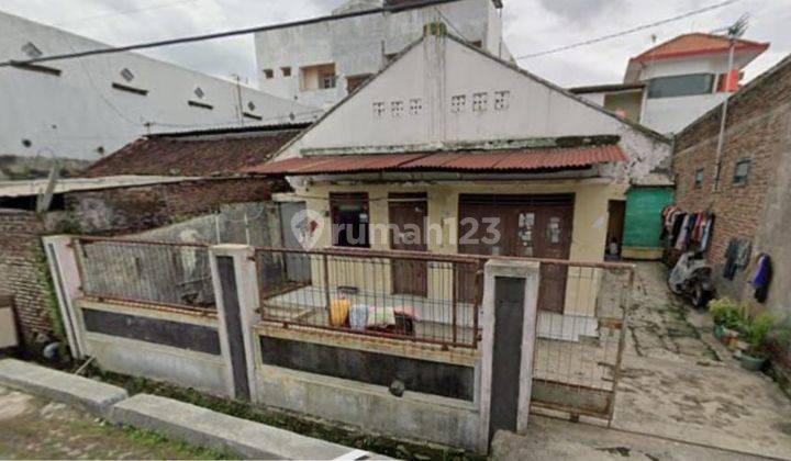 Jual rumah tengah kota orientasi tanah Pusponjolo  2