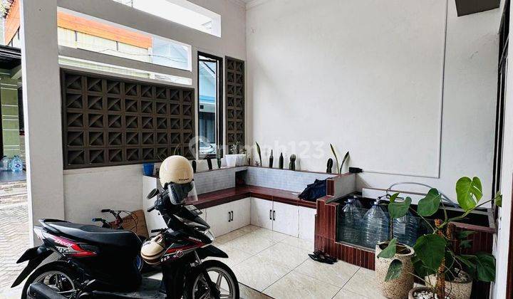 garasi/carport rumah bagus full furnished di
