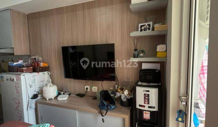 kamar tidur apartemen studio siap huni di