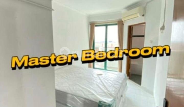 kamar tidur apartemen graha cempaka mas -