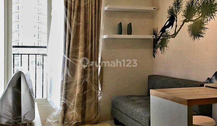 ruang keluarga apartemen podomoro golf view cimanggis