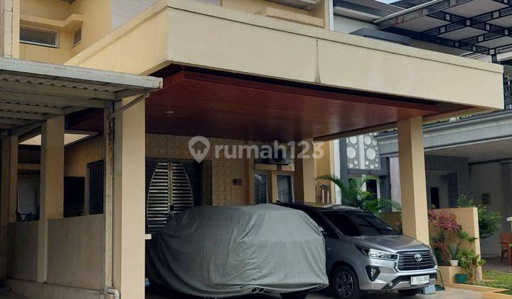 RUMAH SEMI FURNISH DENGAN KOLAM RENANG DALAM CLUSTER  1