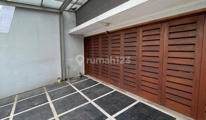 Hadap Timur Rumah Pluit Permai Model Minimalis 1